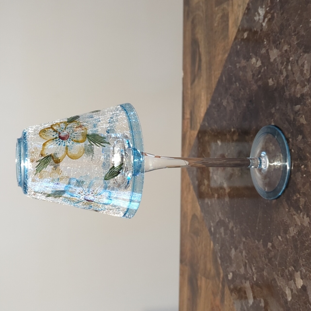 Tall glass tea light holder